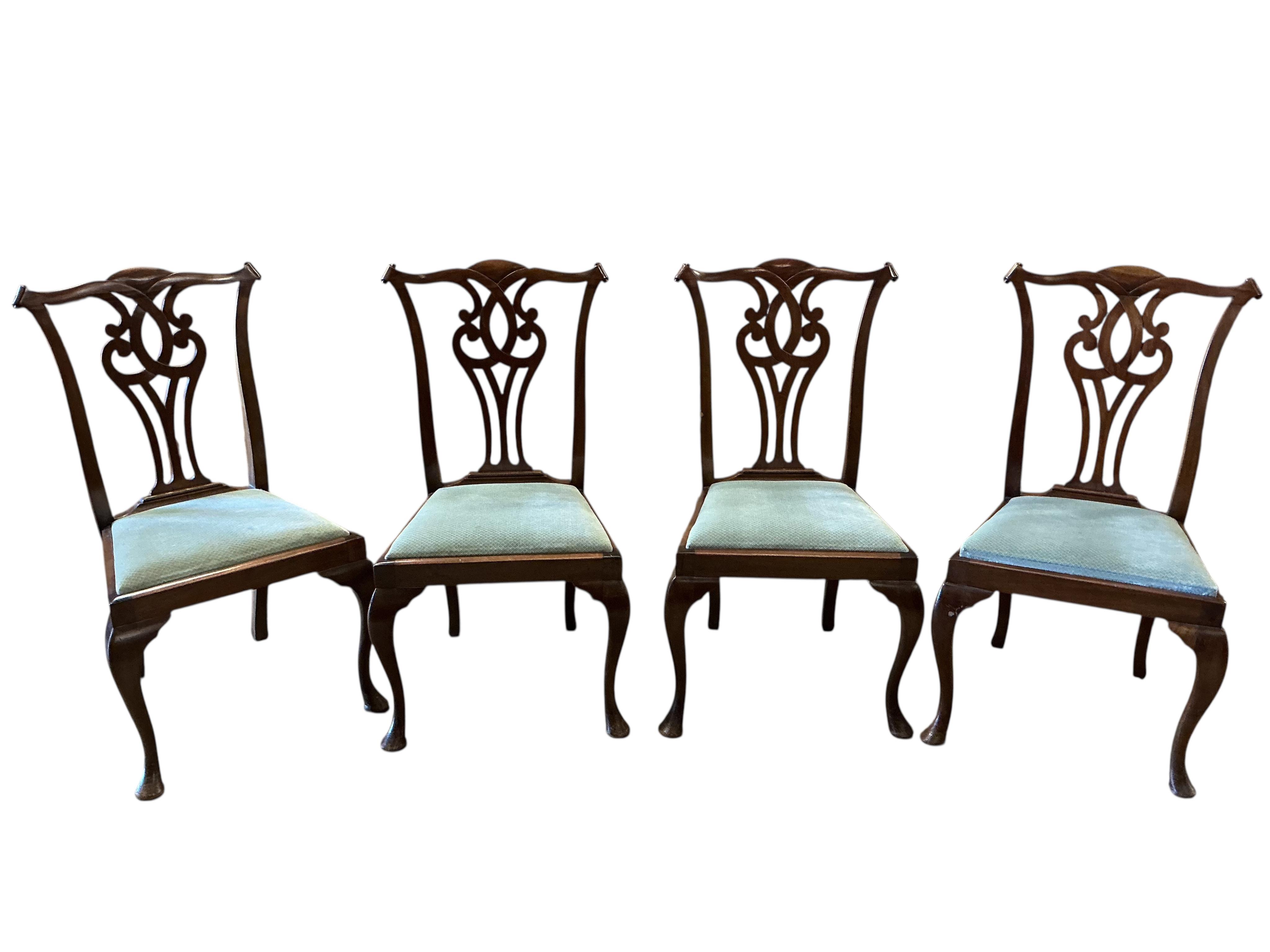 A set of eight George III style mahogany dining chairs, two with arms